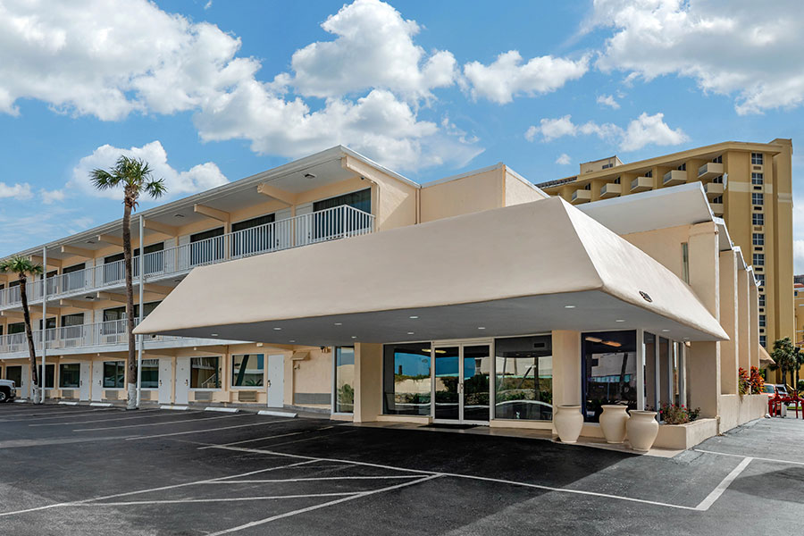 exterior and parking lot of Quality Inn Daytona Beach